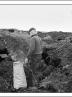 Postcard of striking miners picking coal on spoil tips near Mardy Colliery in February 1985.