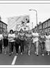 Postcard of Maerdy Women’s Support Group on a march in Ferndale, The Rhondda, on 27th August 1984.