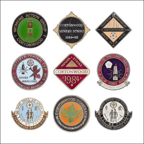 Greetings card of a collection of enamel badges from Cotonwood Colliery.