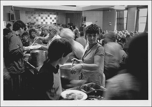 The greetings card of Marilyn Johnson serving lunch during the August school holidays in 1984 at the Colliery Club, Easington Colliery, County Durham.