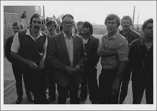 Greetings card of pickets at the front gates of easington Colliery on 20th August 1985 as the police try to get the first working miner into the pit.