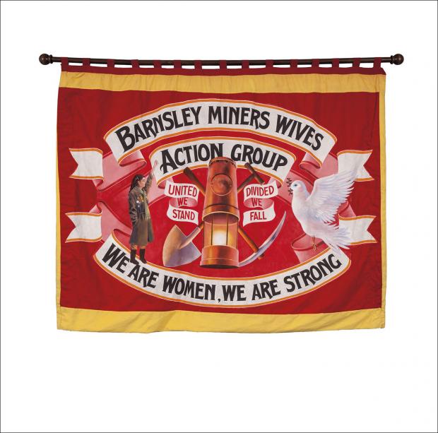 The front page of the greetings card of the banner of the Barnsley Miners Wives Action Group  showing the front of the banner.