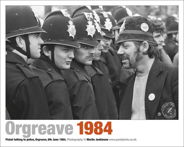 Poster of a picket facing a line of police officers at Orgreave coking plant, June 1984.