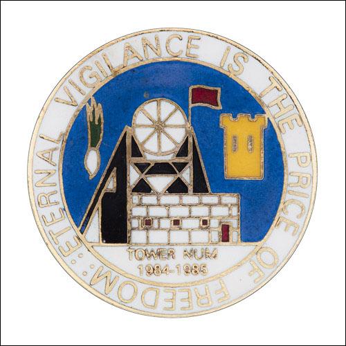 Greetings card of the enamel badge of Tower Lodge of South Wales Area of the NUM.