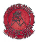 Greetings card of the enamel badge for the Leicestershire striking miners.