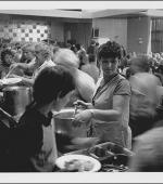 The greetings card of Marilyn Johnson serving lunch during the August school holidays in 1984 at the Colliery Club, Easington Colliery, County Durham.