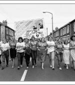 Postcard of Maerdy Women’s Support Group on a march in Ferndale, The Rhondda, on 27th August 1984.