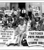 Postcard of women and children demonstrating against £15 being deducted from striking miners’ benefit in lieu of strike pay, which was not being paid, outside the  Welsh Office in Cardiff on 30th July 1984