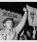 Postcard of Alun ‘Massum’ Jones on the march back to work in Maerdy on 5th March 1985.